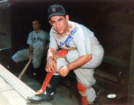 Larry 'Yogi' Berra Putting On Shin Guard Signed 11x14 Horizontal Photo