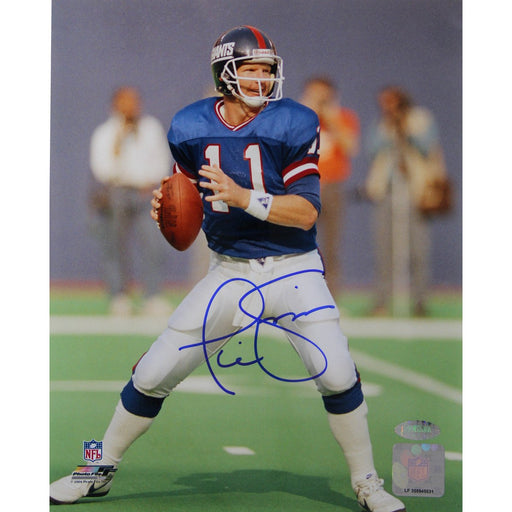 Phil Simms Passing Blue Jersey Vertical 8x10 Photo