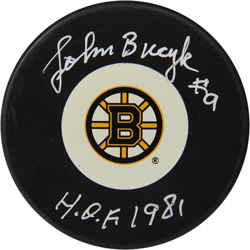 Johnny Bucyk Autographed Bruins Puck w HOF 1981 Insc (Sport Authentix Auth)