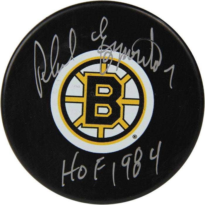 Phil Esposito Autographed Bruins Puck w HOF 1984 Insc (Sport Authentix Auth)