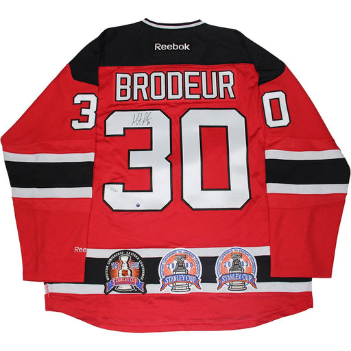 Martin Brodeur Signed New Jersey Devils Red Reebok Premier Jersey w 1995 2000 and 2003 SC Patch (LE30)