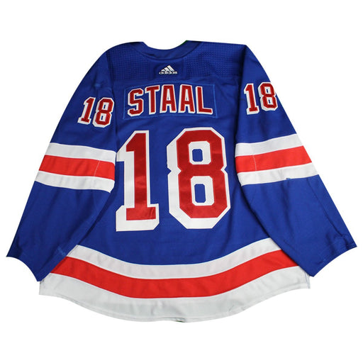 Marc Staal New York Rangers 2017-2018 Game Used #18  Set 2  Blue Jersey w/ 100th Anniversary Patch (removed) worn 11/24/17-2/18/18) (With Assistant captain A) Size 58