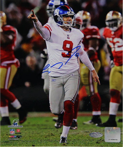 Lawrence Tynes Celebrating vs. San Francisco Vertical 8x10 Photo