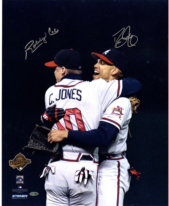 David Justice/Bobby Cox Dual Signed Hugging Chipper Jones 16x20 Photo