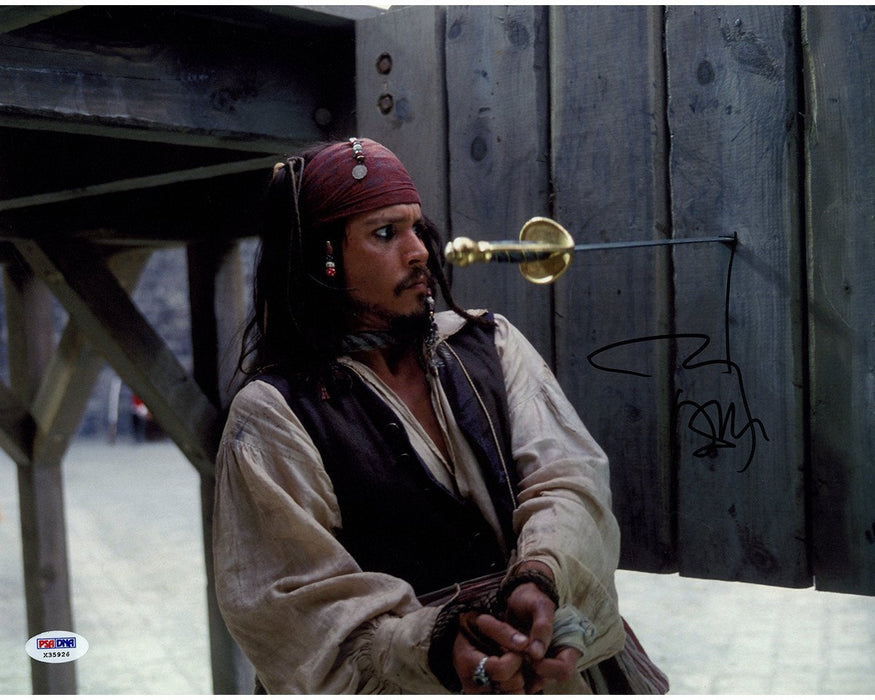 Johnny Depp Signed Pirates of the Caribbean "Sword in Wall" 11x14 Photo (PSA/DNA)