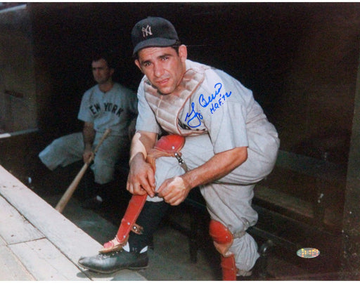 Yogi Berra Putting On Shin Guard  11x14 Horizontal Photo w/ “HOF 72” insc