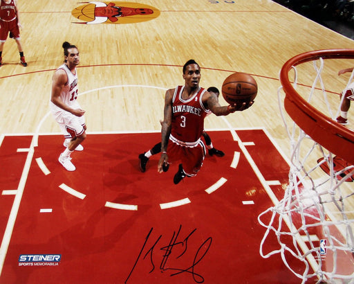 Brandon Jennings Shoots Against Chicago Bulls Signed 8x10 Photo (Getty #159212959)