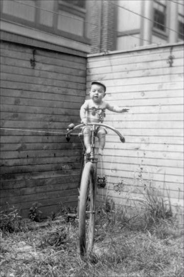 Baby on Unicycle 20x30 poster