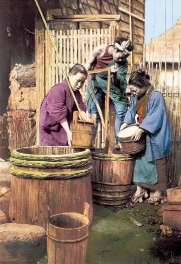 Washing Rice Before Grinding 28x42 Giclee on Canvas