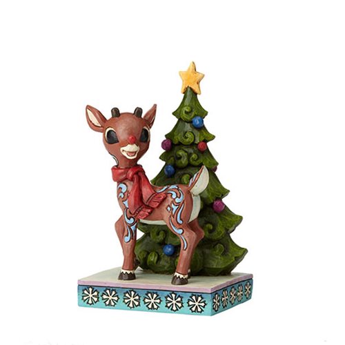 Rudolph the Red-Nosed Reindeer Standing by Tree Statue      