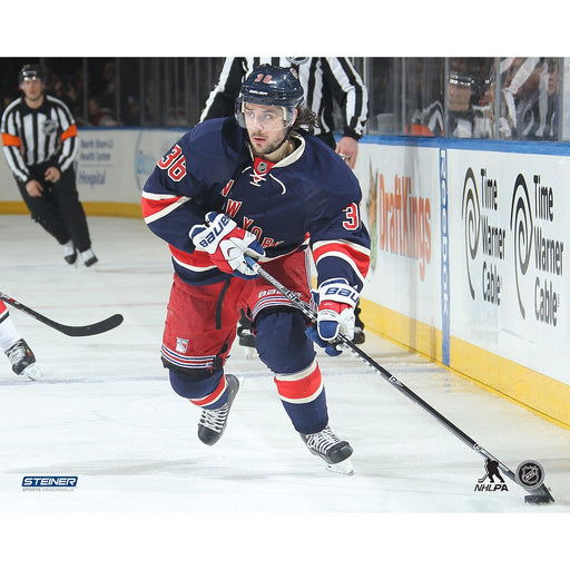 Mats Zuccarello Unsigned skates with the puck in Heritage Jersey 8x10 (Getty #462762366)