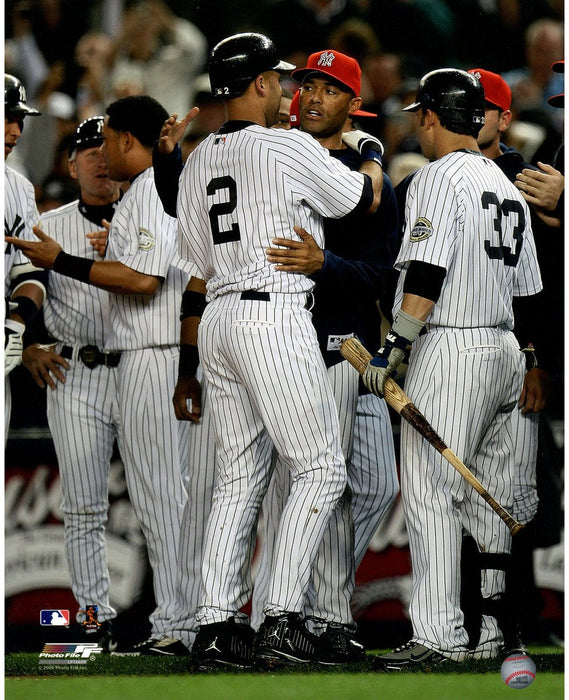 Derek Jeter Being Congratulated by Mariano Rivera after passing Lou Gehrig's Record for Most Hits By A Yankee 16x20 Photo uns