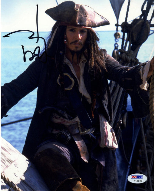 Johnny Depp Signed Pirates of the Carribean "Posing on Ship" 8x10 Photo (PSA/DNA)