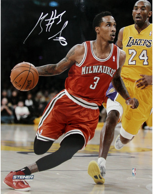 Brandon Jennings Drives Passed Kobe Bryant Signed 8x10 Photo(Getty #159553698)