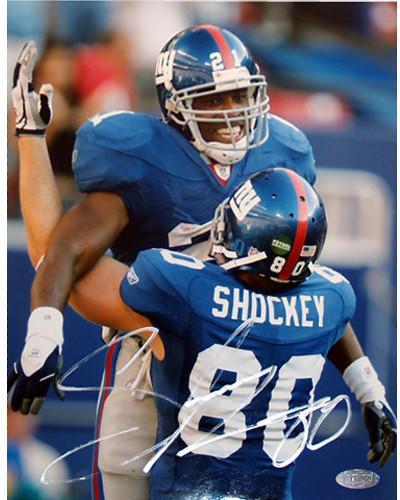 Jeremy Shockey Picking up Tiki 8x10